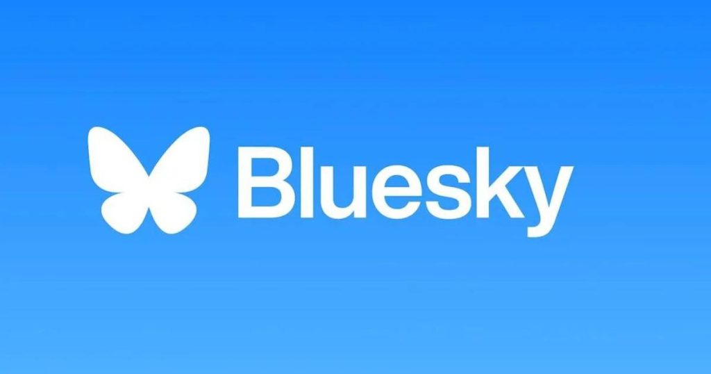 Logo do Bluesky: uma borboleta branca seguida do nome Bluesky em um fundo azul.